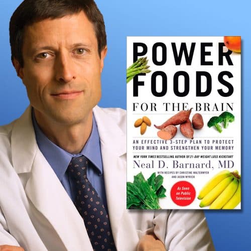 Bărbat în halat alb lângă coperta cărții „Power Foods for the Brain”, de Neal D. Barnard